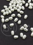 Perlă plastic ecru 7x5mm gaură 1mm 40 grame ~500 buc 312976