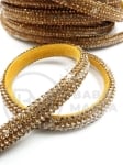 Piele întoarsă naturală 10x~5mm cu cristal auriu 1 metru 421250